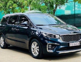 Cho thuê xe 7 chỗ Kia Carnival giá rẻ đi quận 5 TPHCM